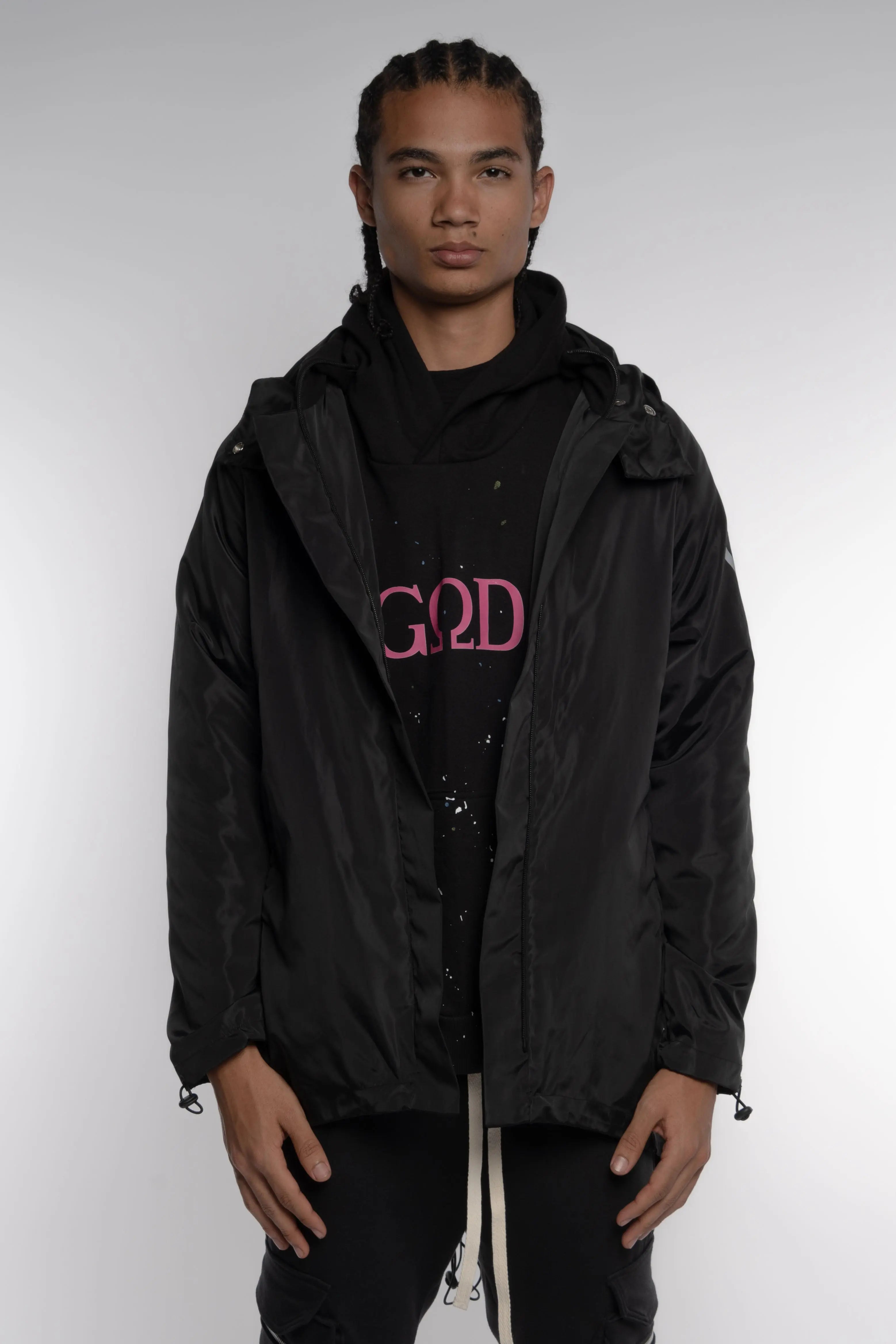 Abrigo impermeable negro con reflejante Young God Mexico