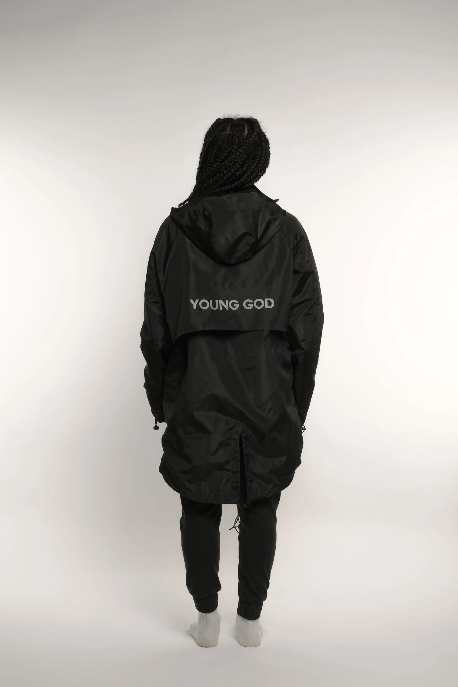 Abrigo impermeable negro con reflejante Young God Mexico