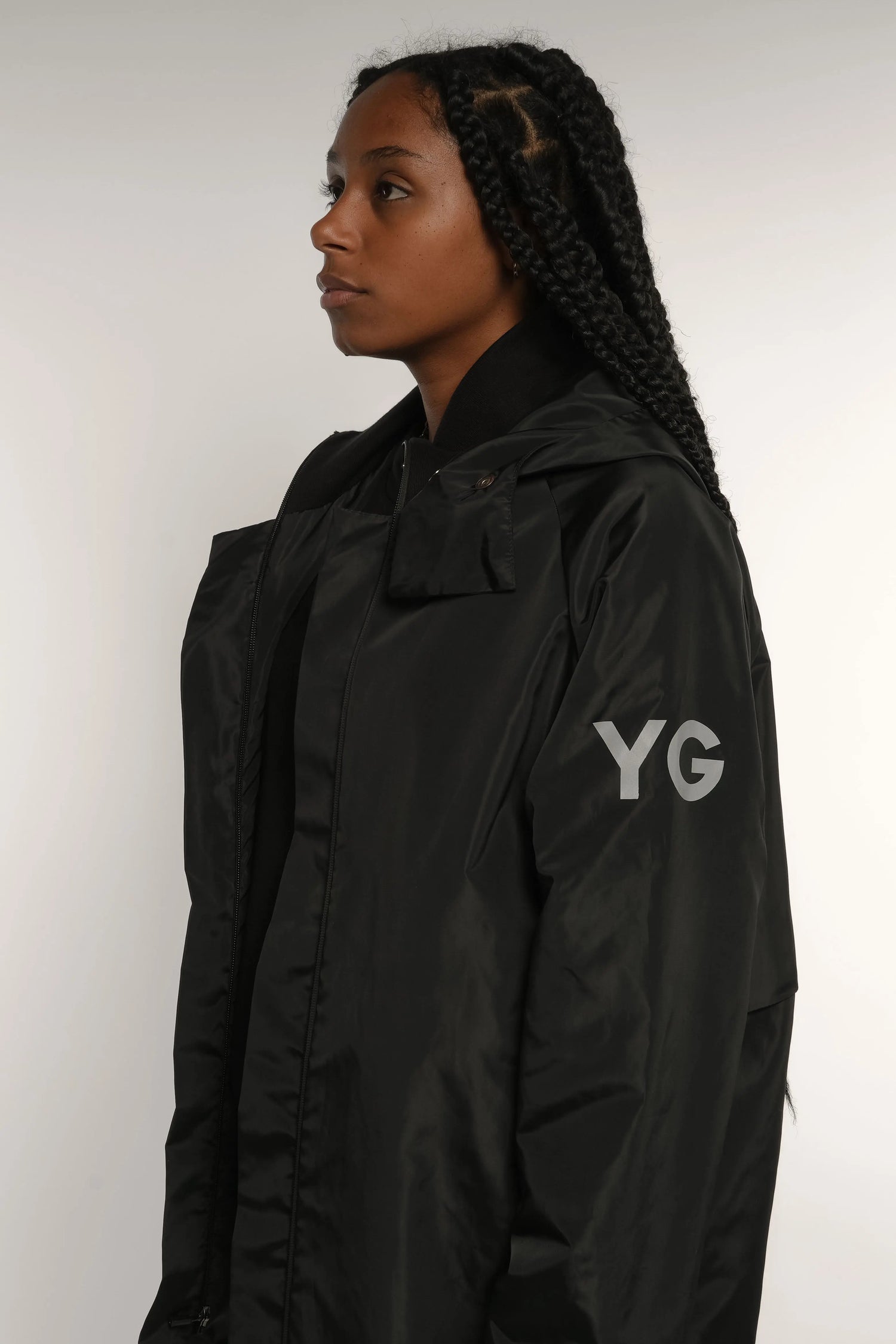 Abrigo impermeable negro con reflejante Young God Mexico