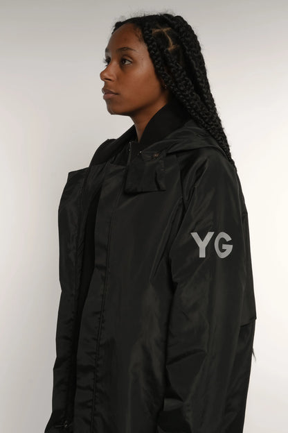 Abrigo impermeable negro con reflejante Young God Mexico